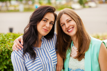 Closeup portrait of a happy young women smiling