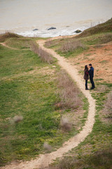 Romantic attractive young couple spending time together outdoors