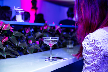 .Lonely girl in a nightclub