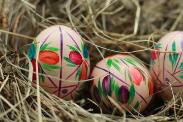 easter eggs and a nest of hay