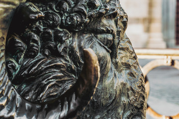 Bronze Rams Head located below the statue of Viriato. Zamora. Spain. Emblematic Lusitanian Warrior statue on a granite pedestal crossed by a Battering Ram with a ram head.