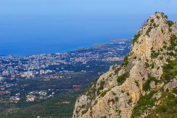 Naklejka premium the background is blurred, landscape, view of the village of kyrenia from the mountain, from the height of the castle of Saint Hilarion