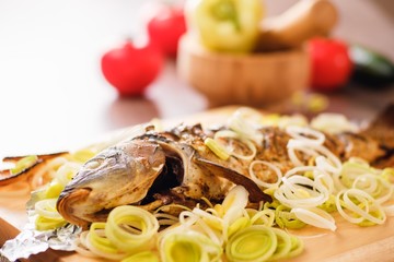 food carp fish meal roasted. lunch.