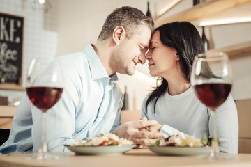 Loving couple smiling to each other