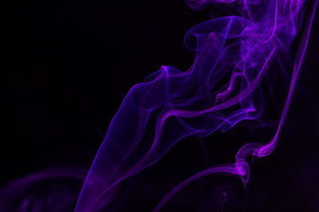 Colorful smoke close-up on a black background