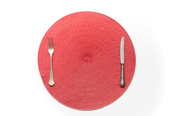 Served festive table setting with red napkin for one person. View from above.