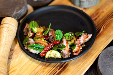 Warm salad with veal