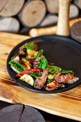 Warm salad with veal