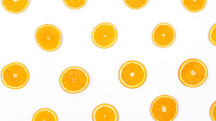 Oranges on a white background. Slices of oranges.