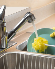 Washing dishes as a daily chore for clenliness and sanitation