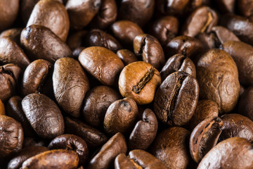 Coffee texture. Roasted coffee beans as background wallpaper.