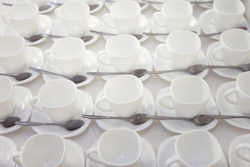 it is a lot of empty white net tea cups