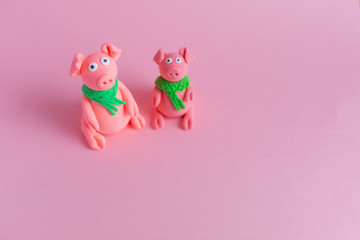 Hand made little plasticine pigs