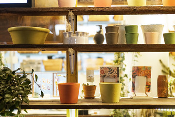 handmade pottery planting pot on shelf