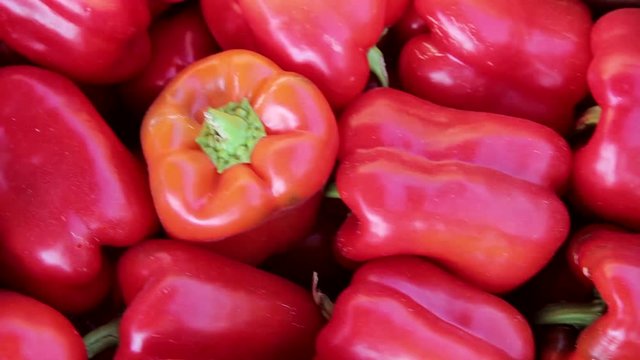 red peppers on display at the market