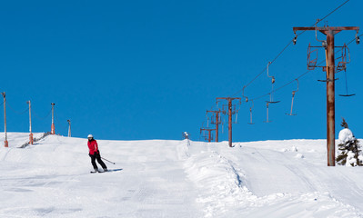 Woman downhill skiing in Lapland Finland