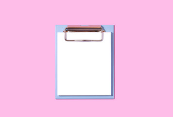 Blue note with white stickers on a pink background.