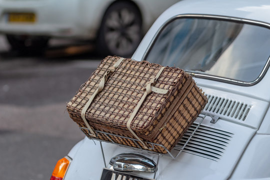 Handmade Wicker Picnic Basket Over White Car Boot