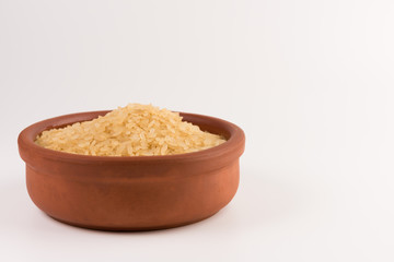 white rice in bowl isolated on white background
