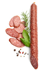Fresh and dried sausage with herbs, top view, isolated on white background