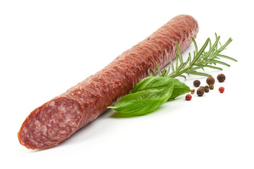 Smoked salami sausage with herbs, close-up, isolated on white background