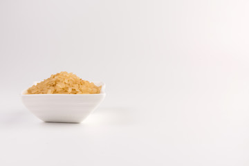 white rice in bowl isolated on white background