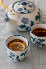 spring detox concept.  Herbal tea in a ceramic tea cups