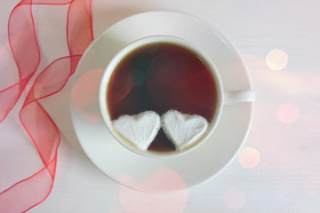 Two hearts in a Cup of coffee. The view from the top. Copy space, can be used as a background, Valentine's day.