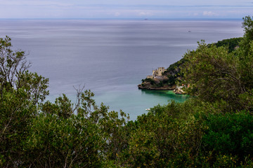 Aerial view of Portinho da Arrábida with horizon in the Serra da Arrábida Natural Park, Setúbal - Portugal