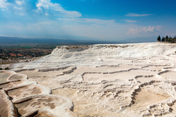 White travertine terraces of Pamukkale or Cotton Palace located in the province of Denizli in Turkey.