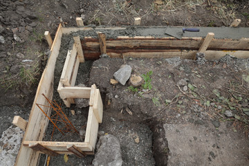 Wall foundation at construction site, concrete and formwork