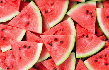 slice of watermelon as textured background - obrazy, fototapety, plakaty