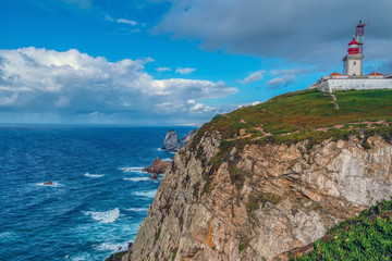 Fototapeta na wymiar View of Lighthouse and cliffs over Atlantic Ocean in Cabo da Roca, Portugal