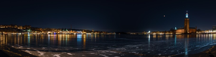 panorama of riddarfjärden lake in stockholm at night