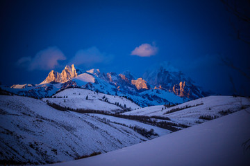Beautiful alpenglow sunset over the Grand Tetons in Wyoming.