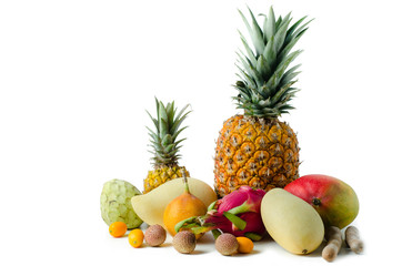 Different tropical fruits isolated on white background