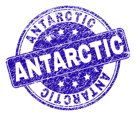 ANTARCTIC stamp seal watermark with grunge texture. Designed with rounded rectangle and circles. Blue vector rubber watermark of ANTARCTIC text with retro texture.