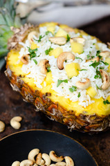 Homemade rice with cashew in pineapple.