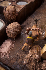 People working in the tannerie of Fez Medina, Morocco