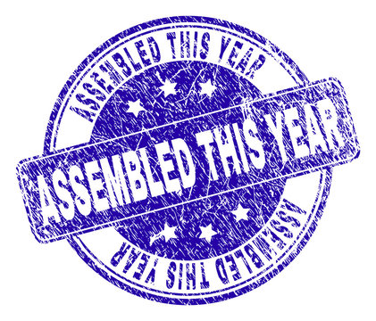 ASSEMBLED THIS YEAR stamp seal watermark with grunge texture. Designed with rounded rectangle and circles. Blue vector rubber watermark of ASSEMBLED THIS YEAR text with dirty texture.