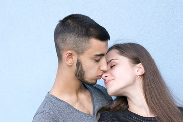 Two loving people together posing outside