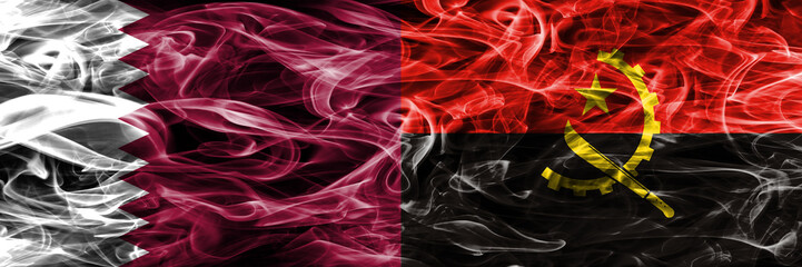 Obraz premium Qatar vs Angola, Angolan smoke flags placed side by side. United Arab Emirates. UAE.