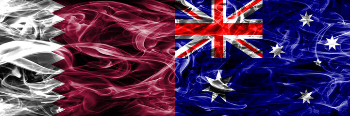 Obraz premium Qatar vs Australia, Australian smoke flags placed side by side. United Arab Emirates. UAE.