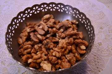Walnuts peeled in a vase on the table