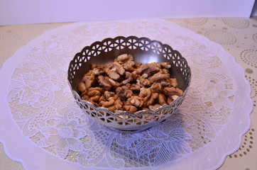 Walnuts peeled in a vase on the table