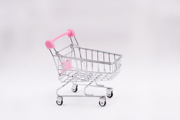 The shopping cart put on white background