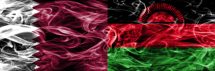 Qatar vs Malawi, Malawian smoke flags placed side by side. United Arab Emirates. UAE.