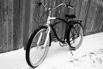 Fototapeta na wymiar Vintage bicycle on Winter Snow - Black & White III