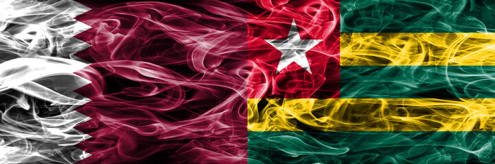 Qatar vs Togo, Togolese smoke flags placed side by side. United Arab Emirates. UAE.