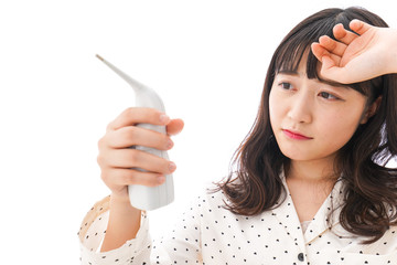 風邪をひいた若い女性・インフルエンザイメージ
